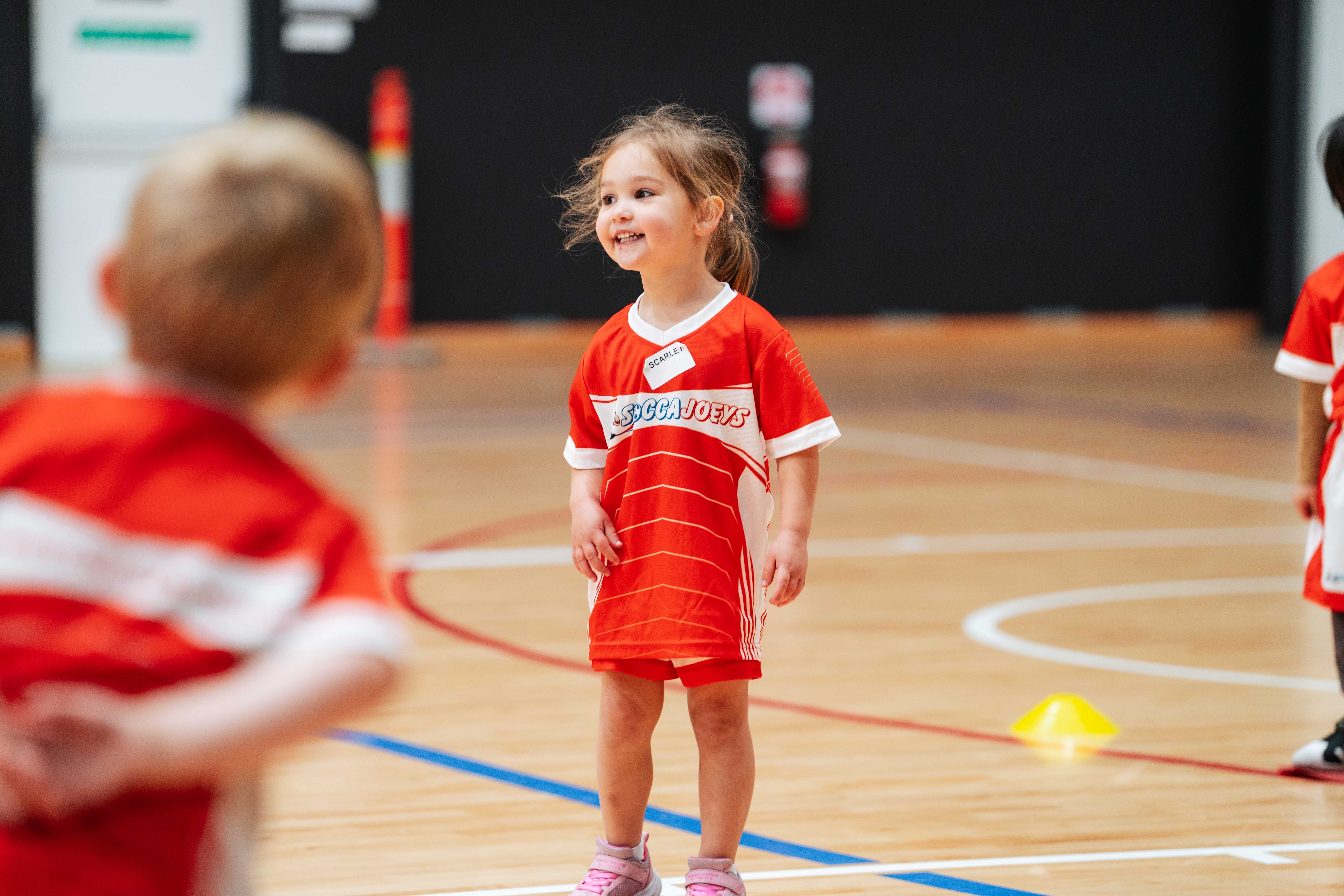 Successful Soccajoeys franchise owner with children